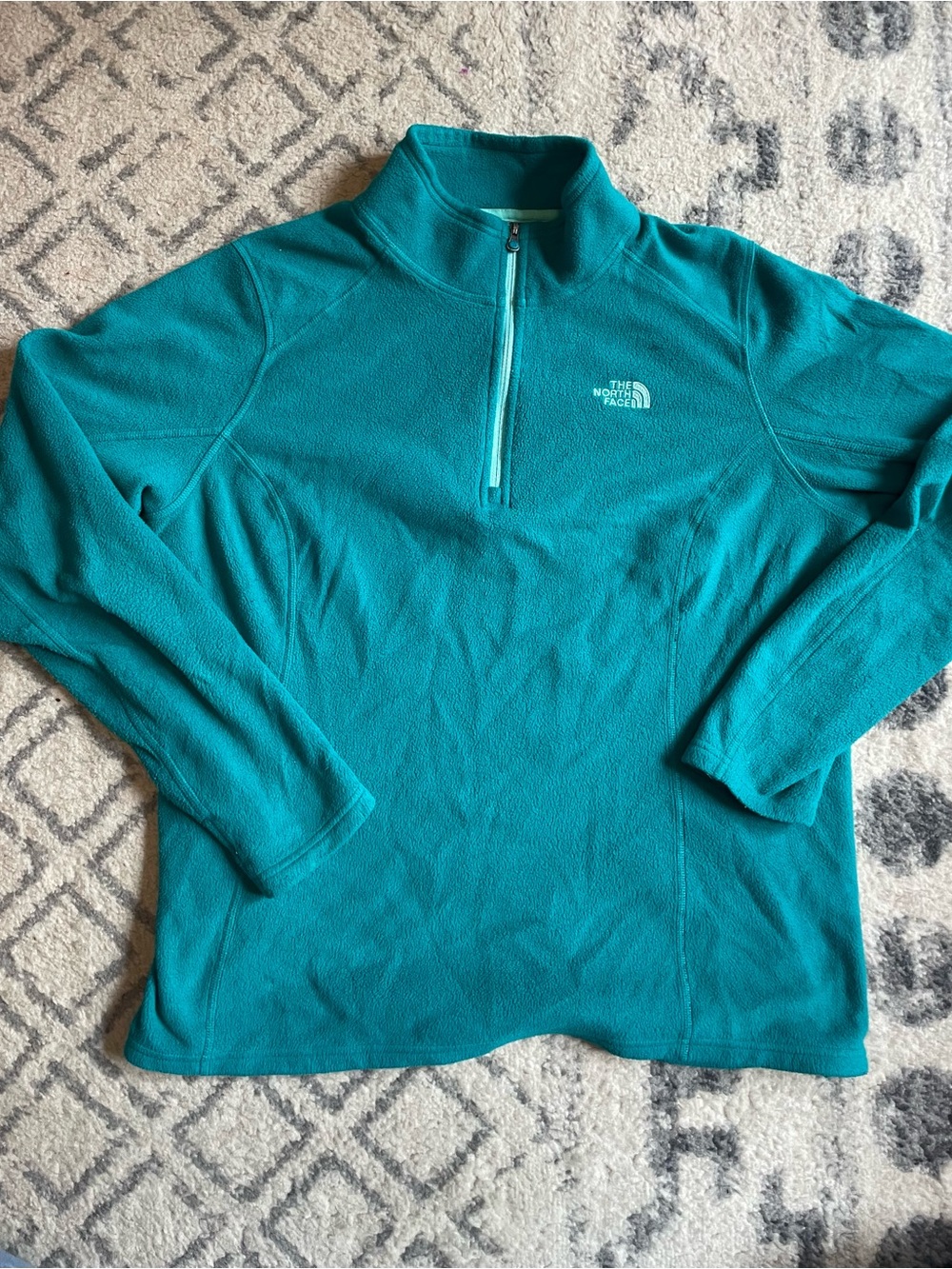 The North Face women’s Teal Quarter-Zip Fleece Pullover